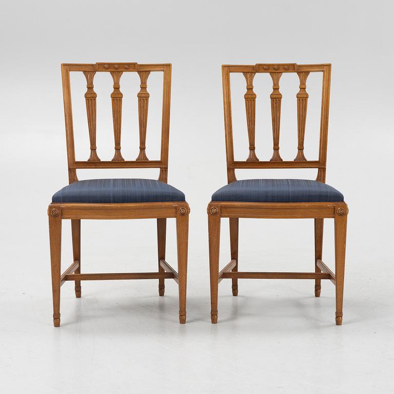 A Dining Table and Twelve Chairs, late Gustavian style, 20th Century.