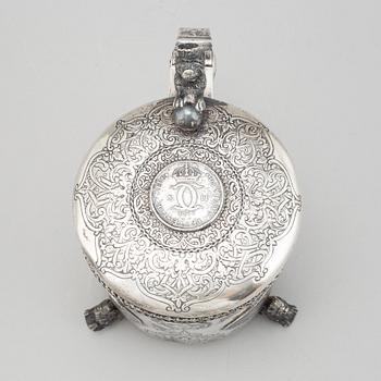 A parcel-gilt silver baroque style tankard.