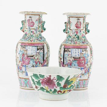A pair of famille rose Canton vases and  a bowl, Qing dynasty, 19th Century.