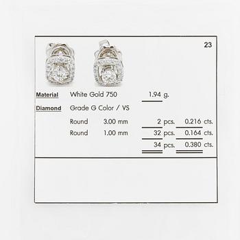Earrings, two-part 18K white gold with brilliant-cut diamonds.