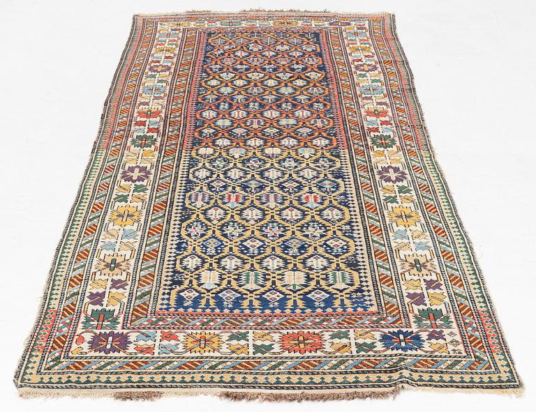 An antique Shirvan runner, circa 313 x 116 cm.