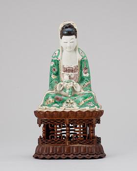 527. A Kangxi-style porcelain figure, Qing dynasty.