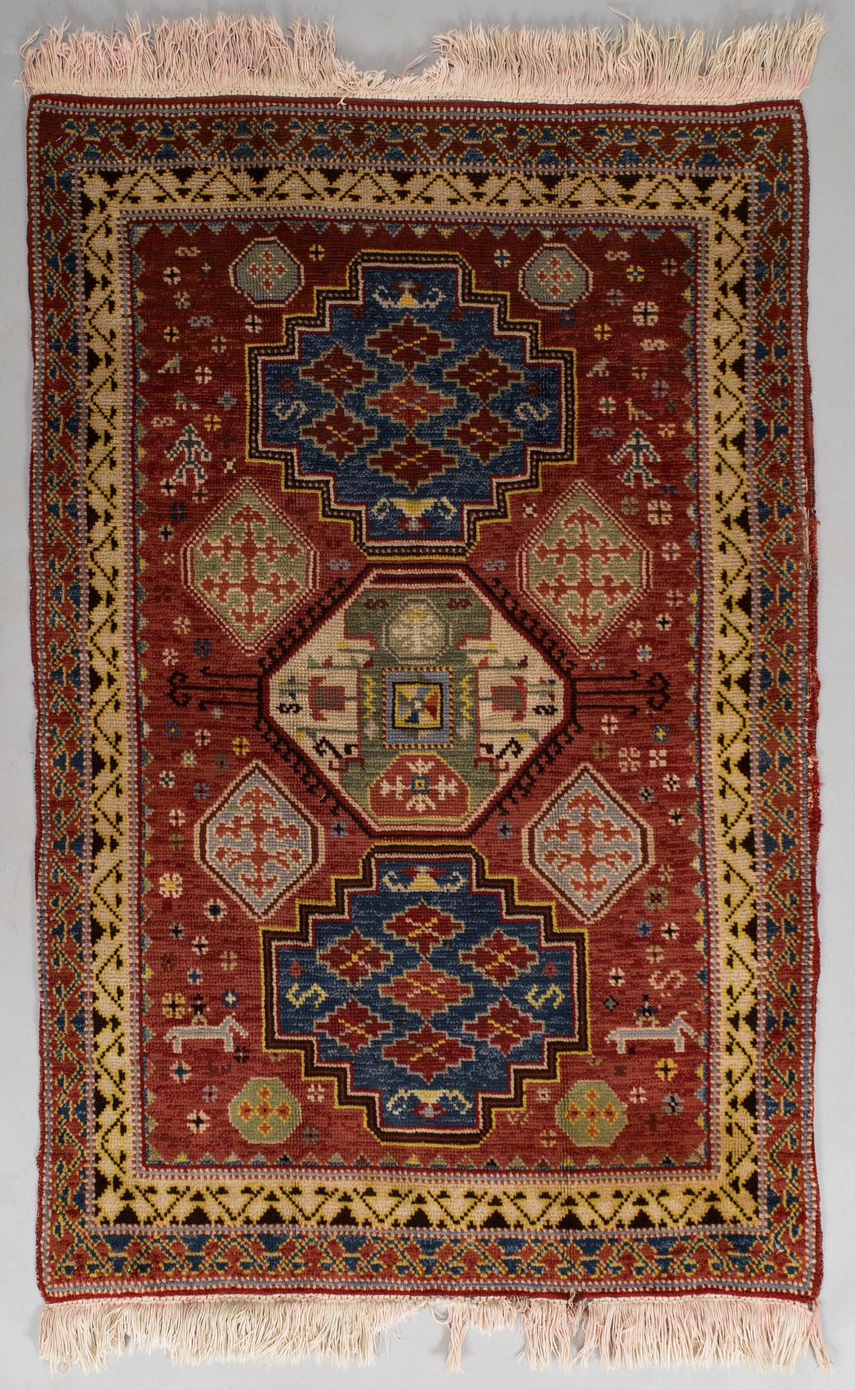 A 1940's Spanish rug Of Kazak design, ca. 139 x 93 cm.