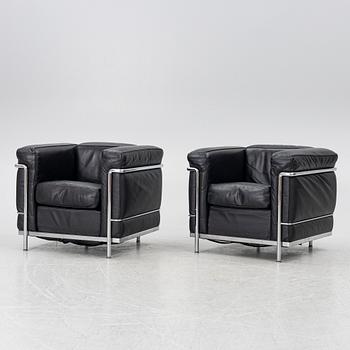 Le Corbusier (Charles-Édouard Jeanneret), Pierre Jeanneret, Charlotte Perriand & Le Corbusier, a pair of 'LC2' armchairs, Cassina.