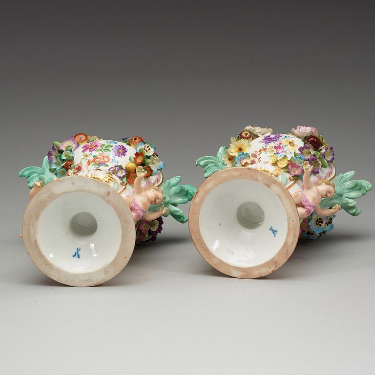 A pair of Meissen pot-purri jars with covers, 19th Century.