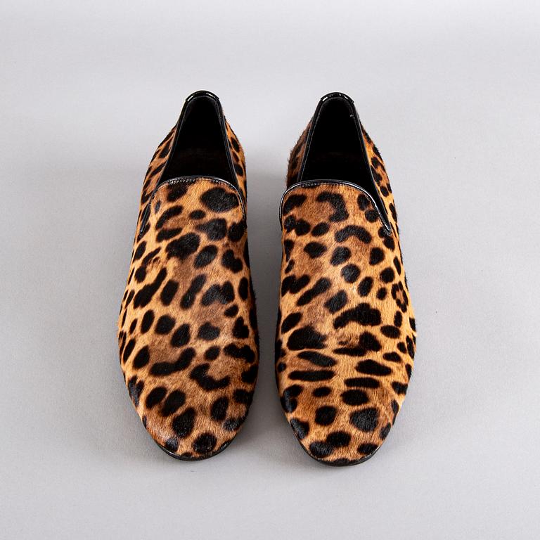 A pair of Jimmy Choo shoes, size 43.