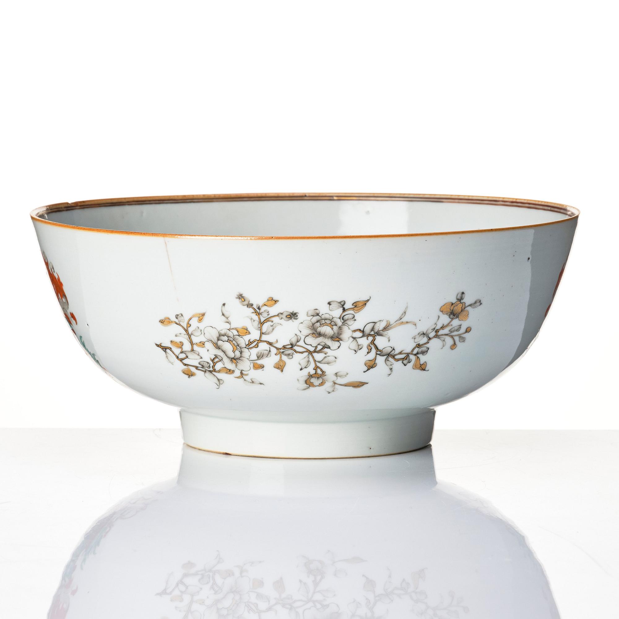 A famille rose and grisaille armorial punch bowl, Qing dynasty, 18th century.