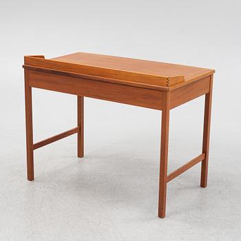 Kerstin Hörlin-Holmquist, a mahogany-veneere desk from the 'Triva' series, Nordiska Kompaniet, 1960's/70's.