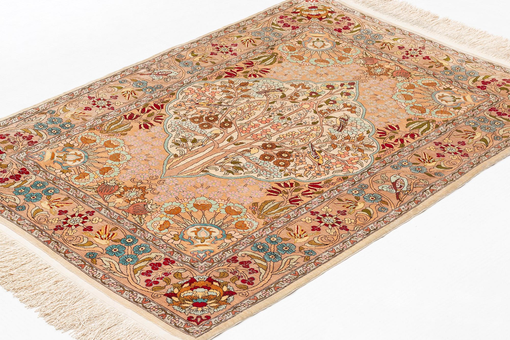 A rug, Old, silk Hereke, ca 128 x 90 cm.