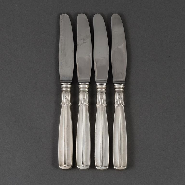 A set of 12 silver and steel knives, model Lotus, Denmark. 20th century.