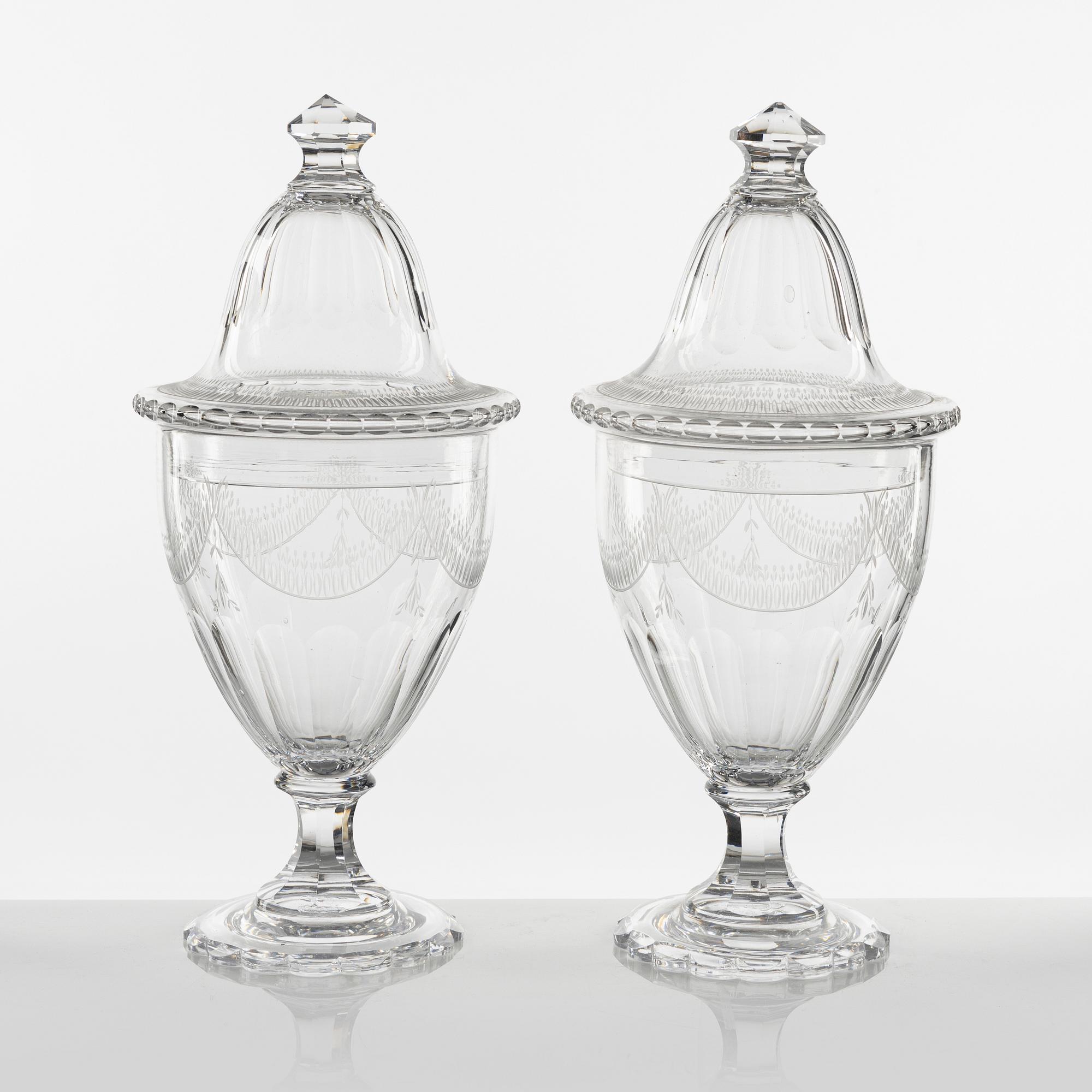 A pair of Gustavian style lidded glass vases, circa 1900.