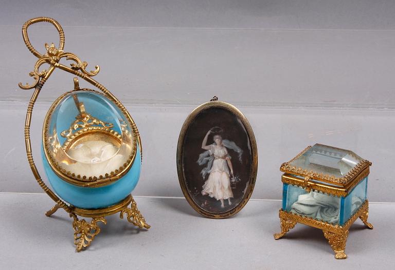 MINIATYRMÅLNING SAMT FICKURSTÄLL OCH URHUS, metall, glas, tidigt 1800-tal resp sent 1800-tal.