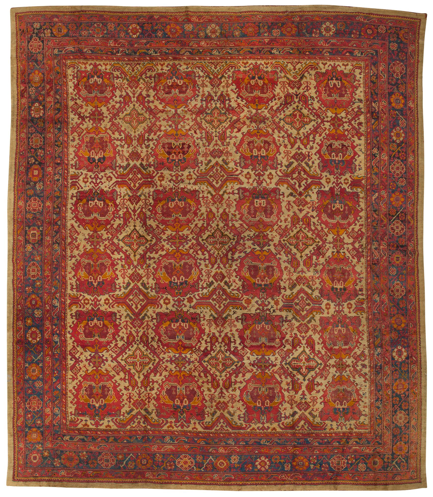 A CARPET. An antique Ushak. 554,5 x 480 cm.