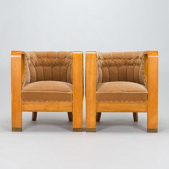 Adolf Koskinen, a pair of armchairs, manufactured by Elias Hollo Puunjalostustehdas, Finland, 1920s.