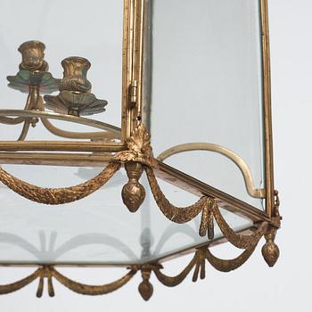 A Swedish rococo gilt-brass four-light lantern, possibly a masterpiece, Stockholm, later part of the 18th century.