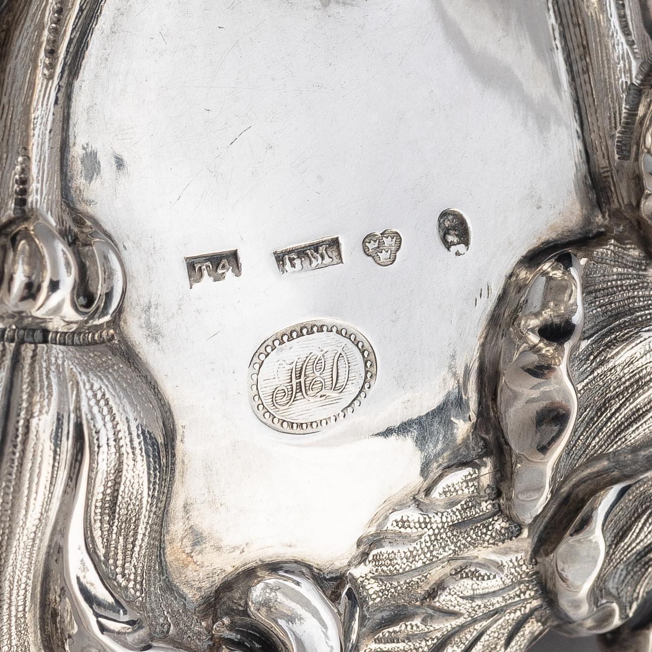 A Swedish 19th century silver sugar bowl with lid, marks of Gustaf Möllenborg, Stockholm 1843.