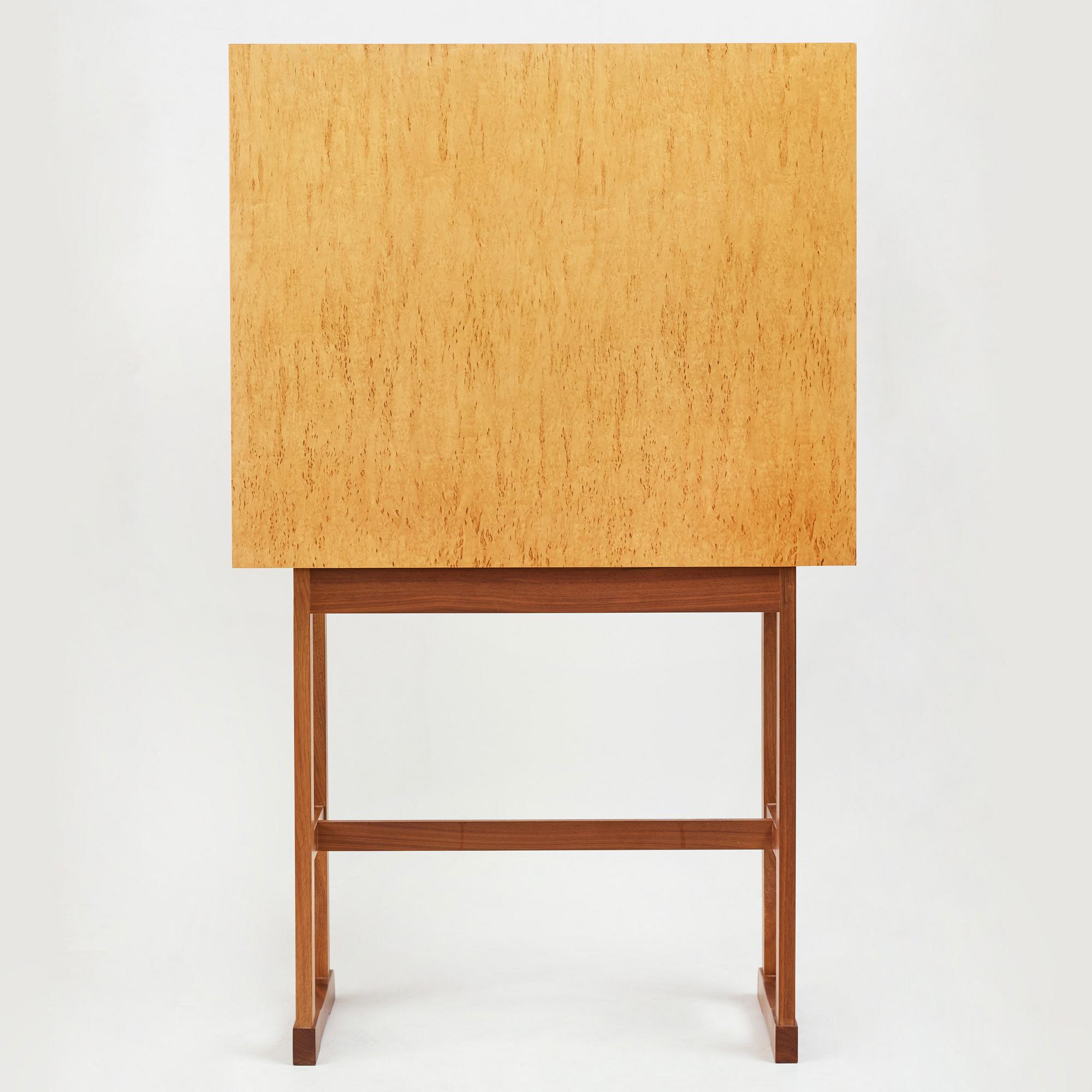 Josef Frank, a birch burrwood and padouck cabinet on stand, model 2215, Svenskt Tenn Sweden probably 1960-70's.