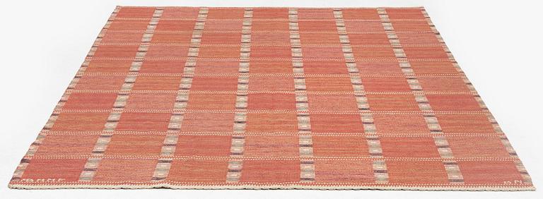 Barbro Nilsson, a carpet, "Falurutan, röd Borås" flat weave, c 246 x 187 cm, signed AB MMF BN.