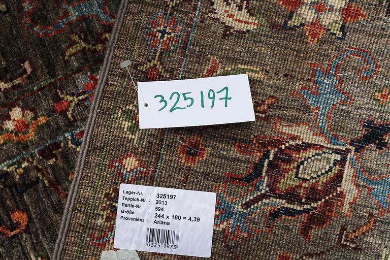 A rug, Zieglar design, ca 244 x 180 cm.