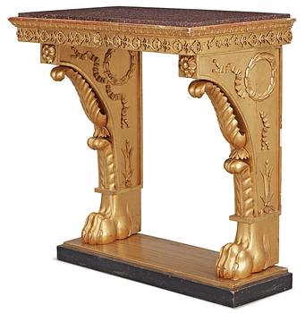577. A Swedish Empire 19th century console table with porphyry top.