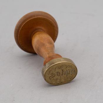 Four items with a royal provenance. Silver candlesticks, silver beaker, brass seal and a telegram.