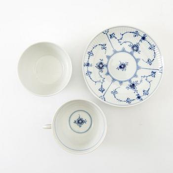 Service approximately 42 pieces "Musselmalet rifflet/halvblonde" Royal Copenhagen Denmark porcelain first half of the 20th century.