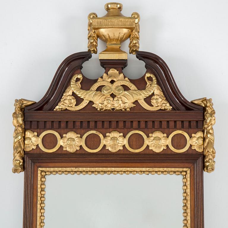 A first half of the 19th century empire mirror.