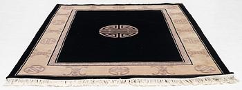 A Chinese rug, approx. 231 x 170 cm.