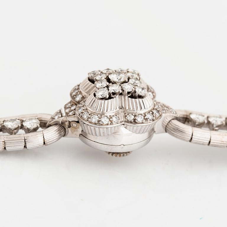 Omega brilliant cut diamond watch.