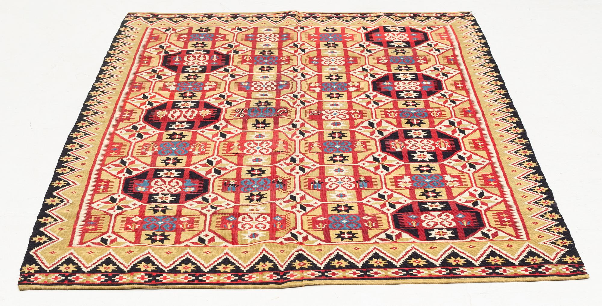 Täcke, rölakan, ca 188 x 116 cm, Skåne, broderad signatur KPD, daterad 1822.