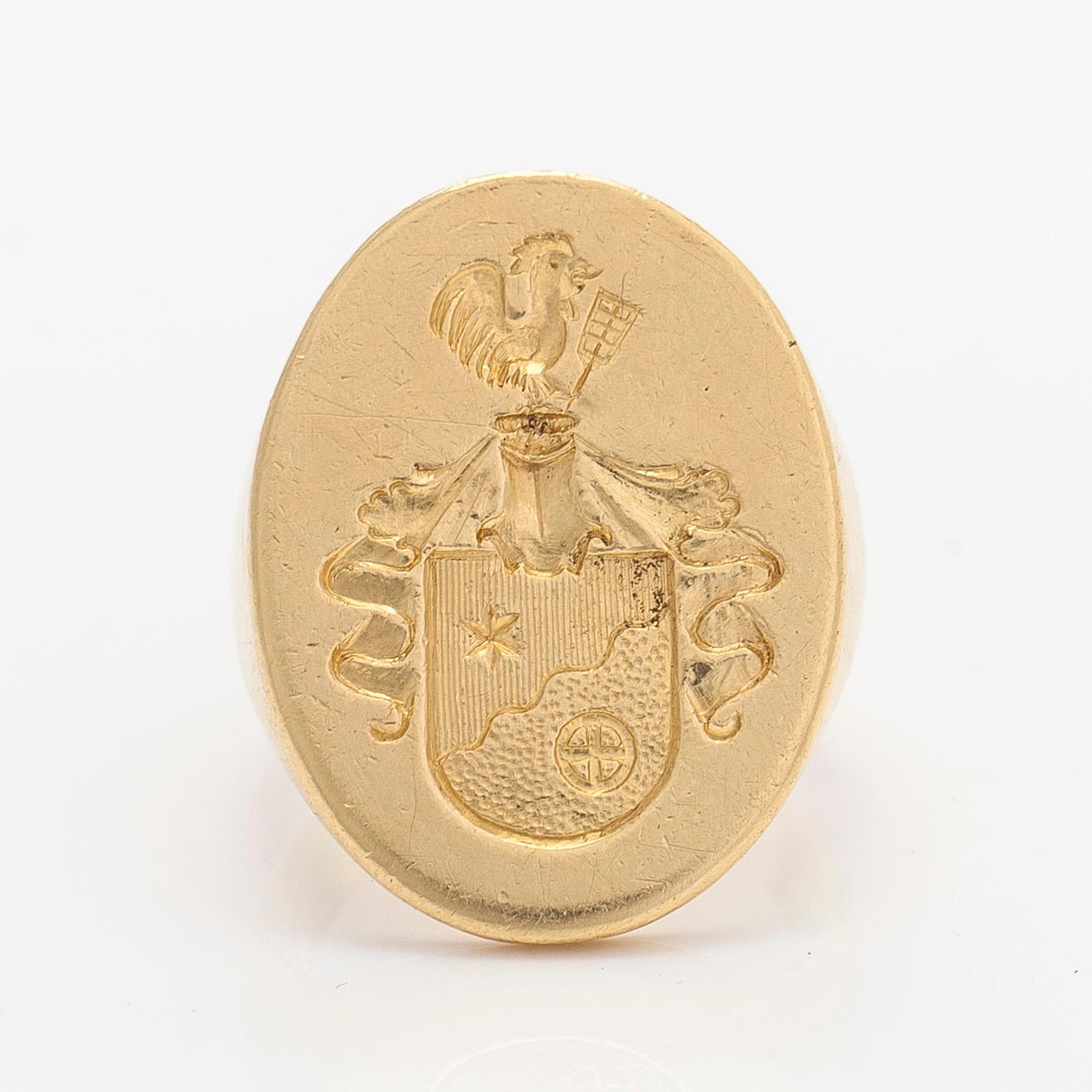 A signet ring, ca. 17K gold.