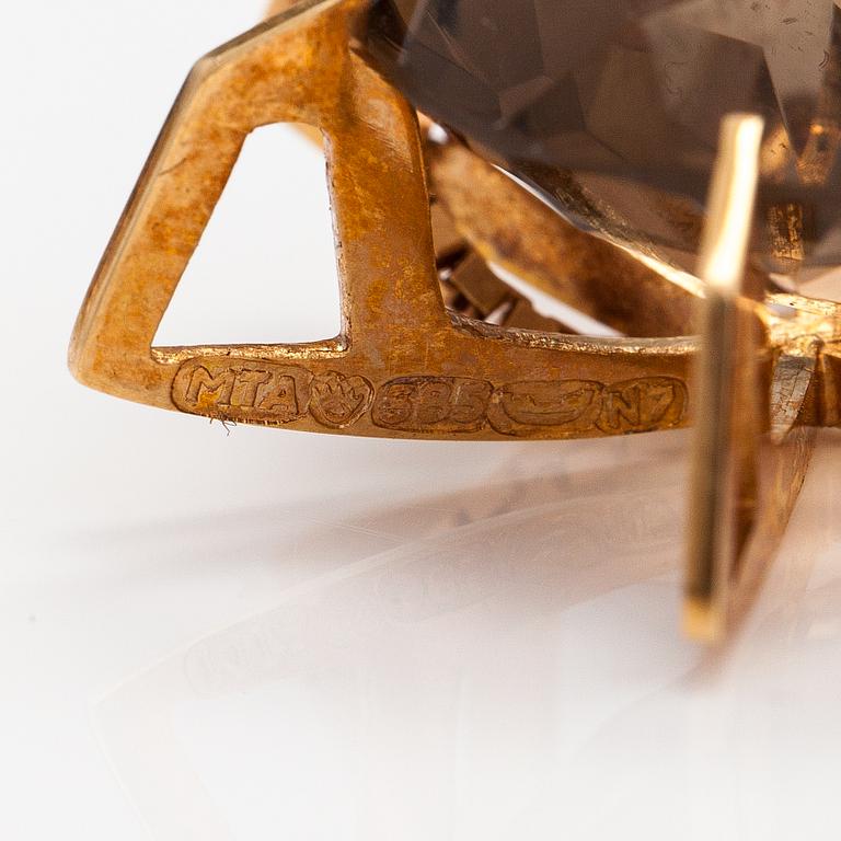A 14K gold necklace with a smoky quartz. Martti Tapio Aarnio, Helsinki 1966.