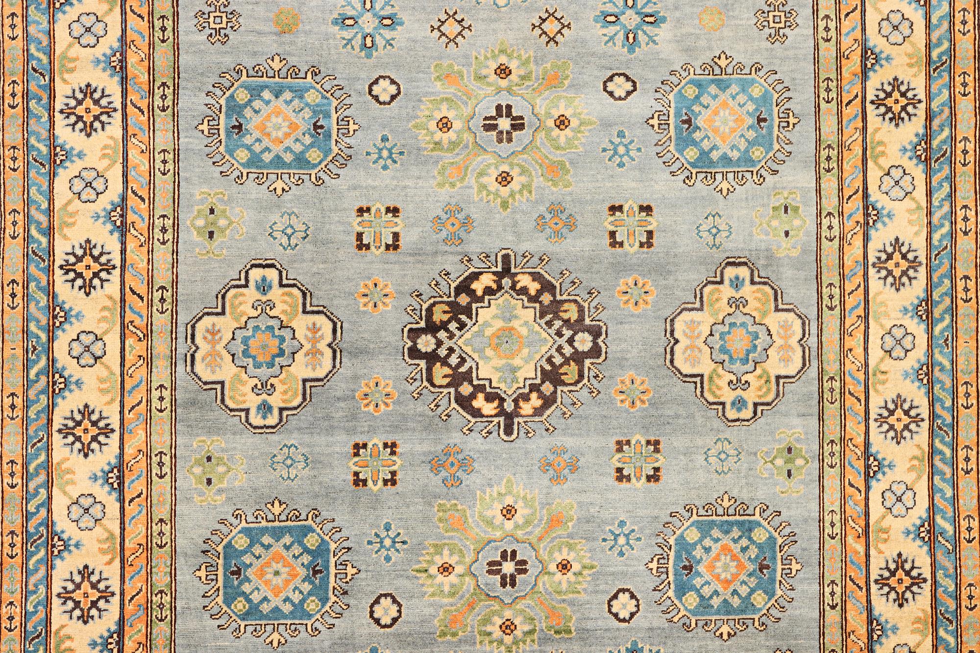 A Kazak carpet, c. 295 x 206 cm.