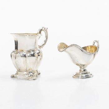 A silver gravy boat, Germany, and a silver creamer, johan Petter Tullgren, Sweden, 1857.