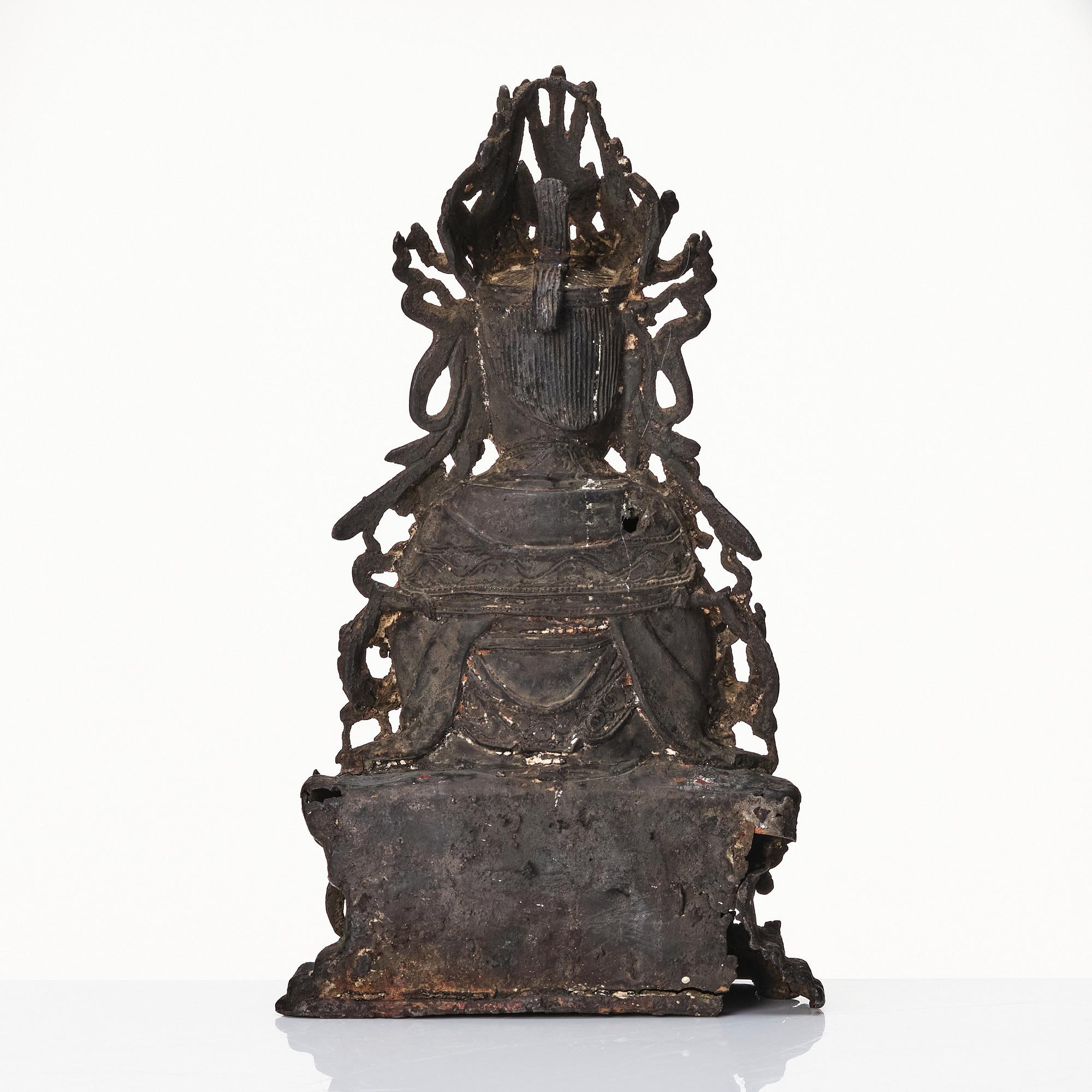A bronze scultpure of Guanyin, Ming dynasty (1368-1644).