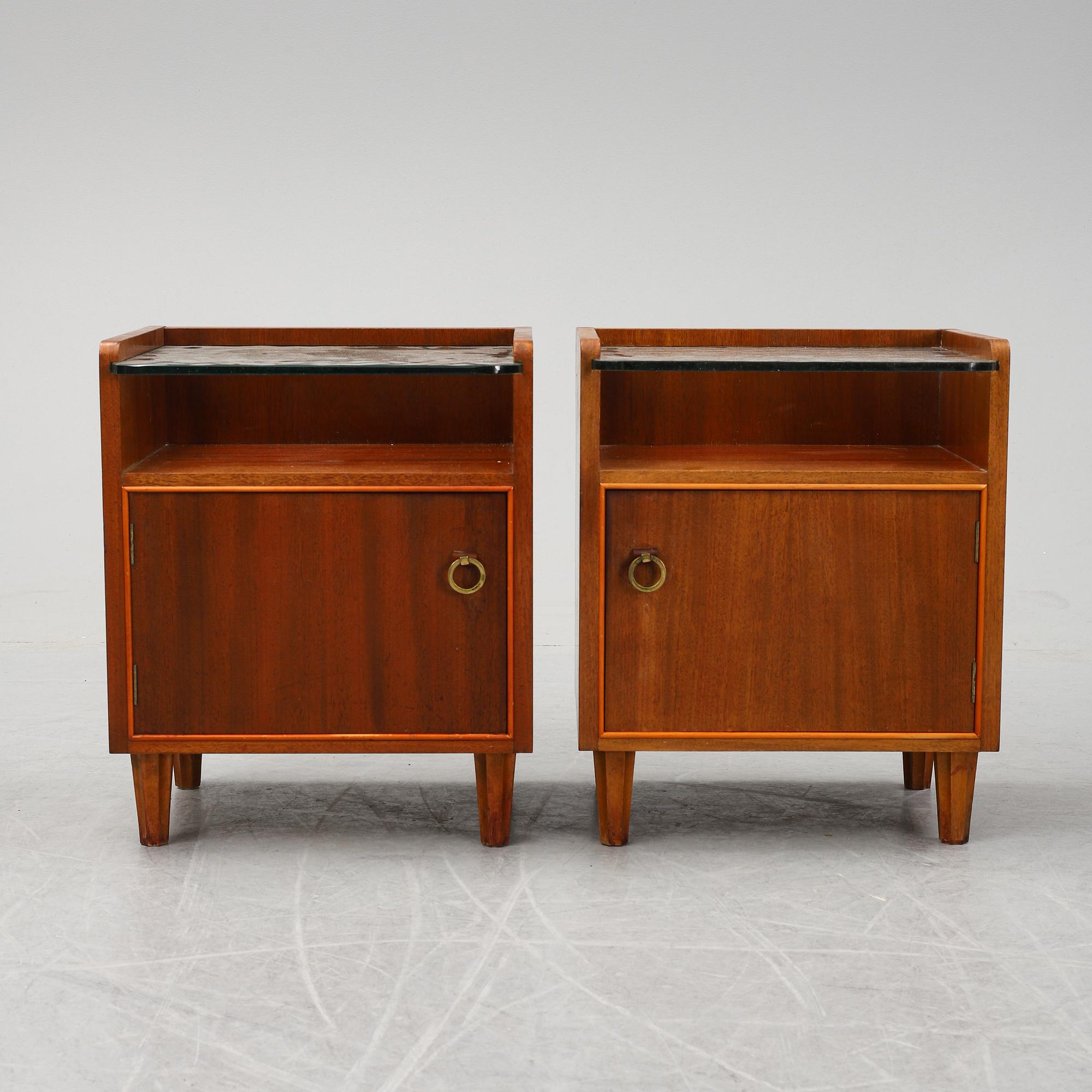 A pair of mahogany bedside tables, mid 20th Century.
