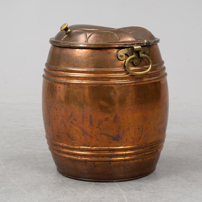 A 19th century copper water barrel.