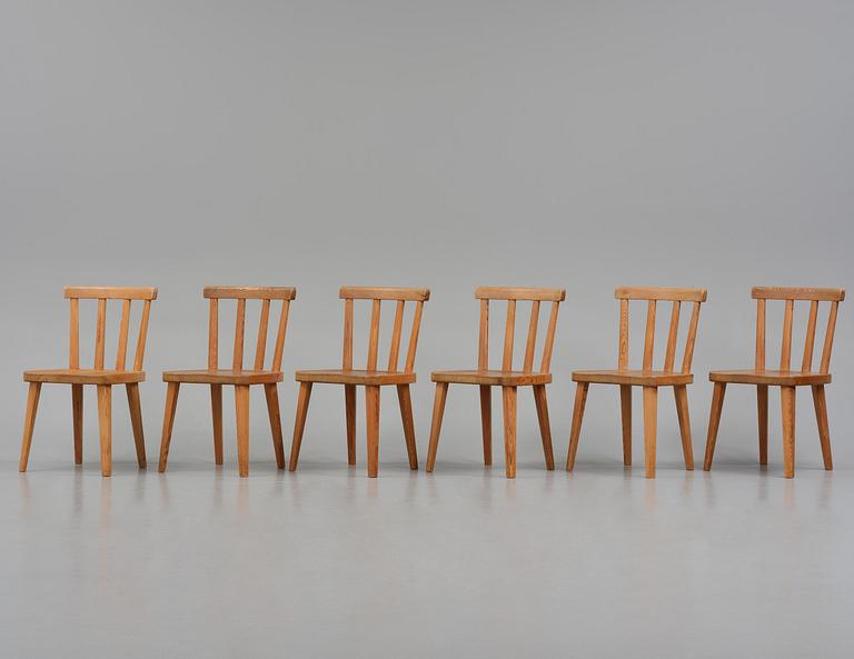 Axel Einar Hjorth, a set of six stained pine "Utö" chairs, Nordiska Kompaniet, Sweden, 1930s.