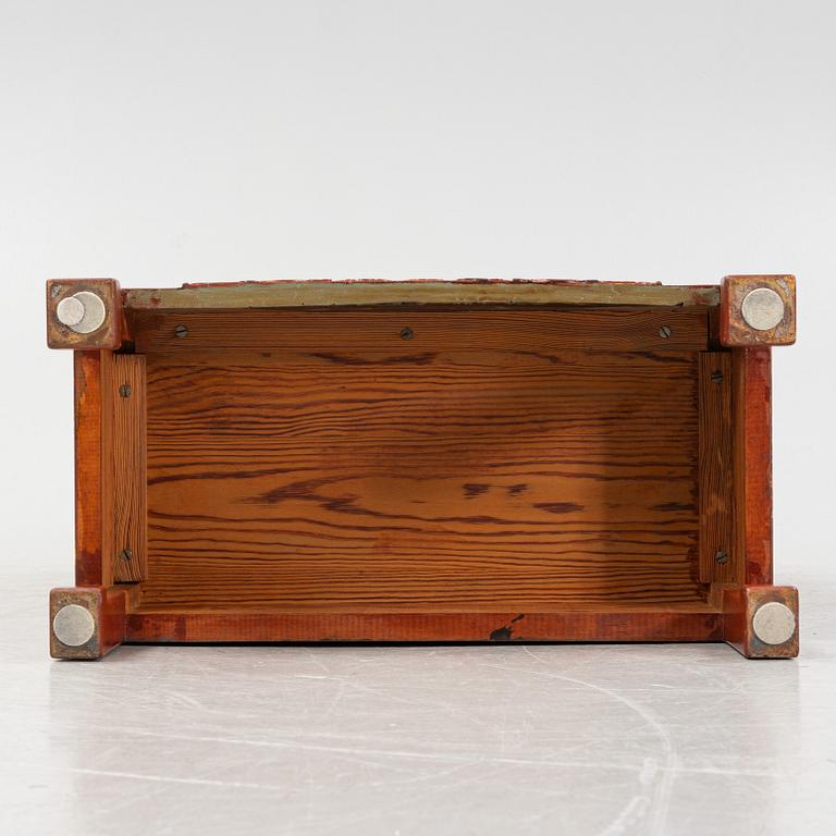 A Chinese cabinet, early 20th Century, with 19th Century carved panels.