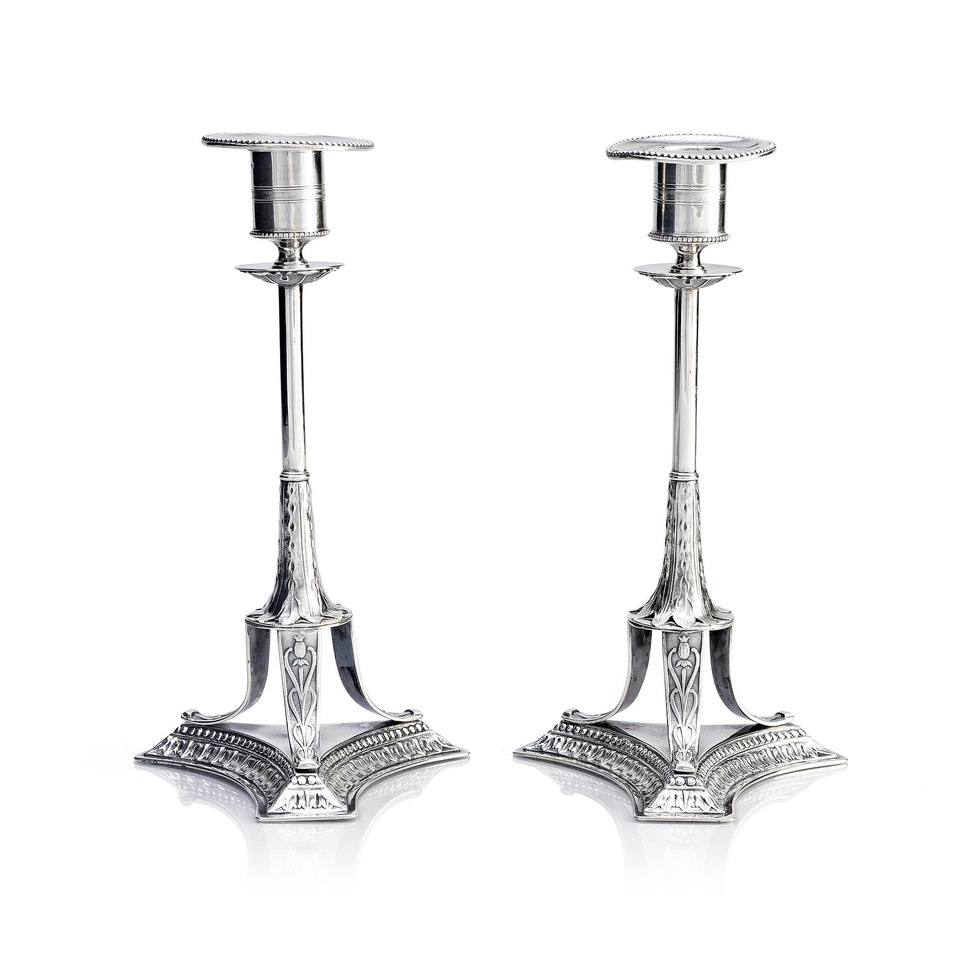A pair of Swedish early 19th century silver candlesticks, marks of Adolf Zethelius, Stockholm 1817.