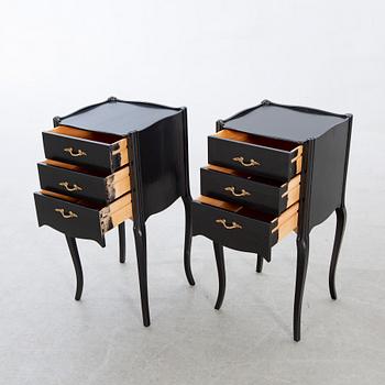 A pair of Rococo-style bedside tables later part of the 20th century.