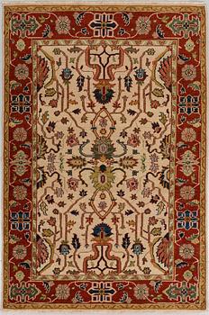 A RUG, Ushak design, ca 184 x 123 cm.