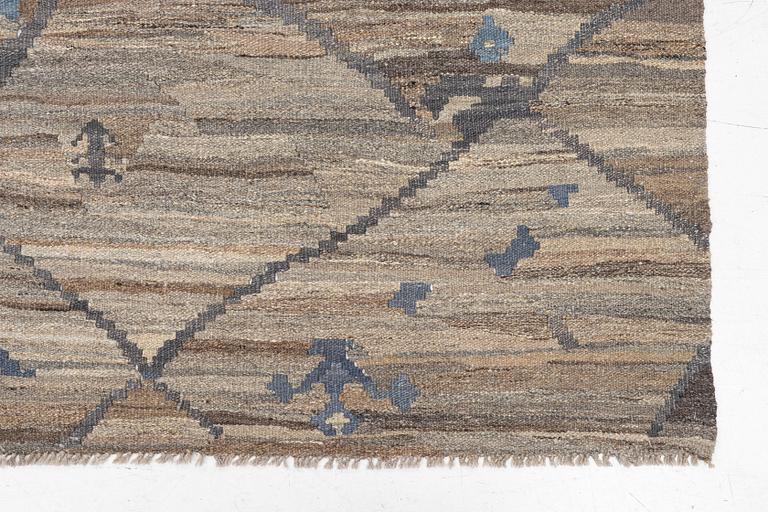 A Kelim carpet, c. 300 x 210 cm.