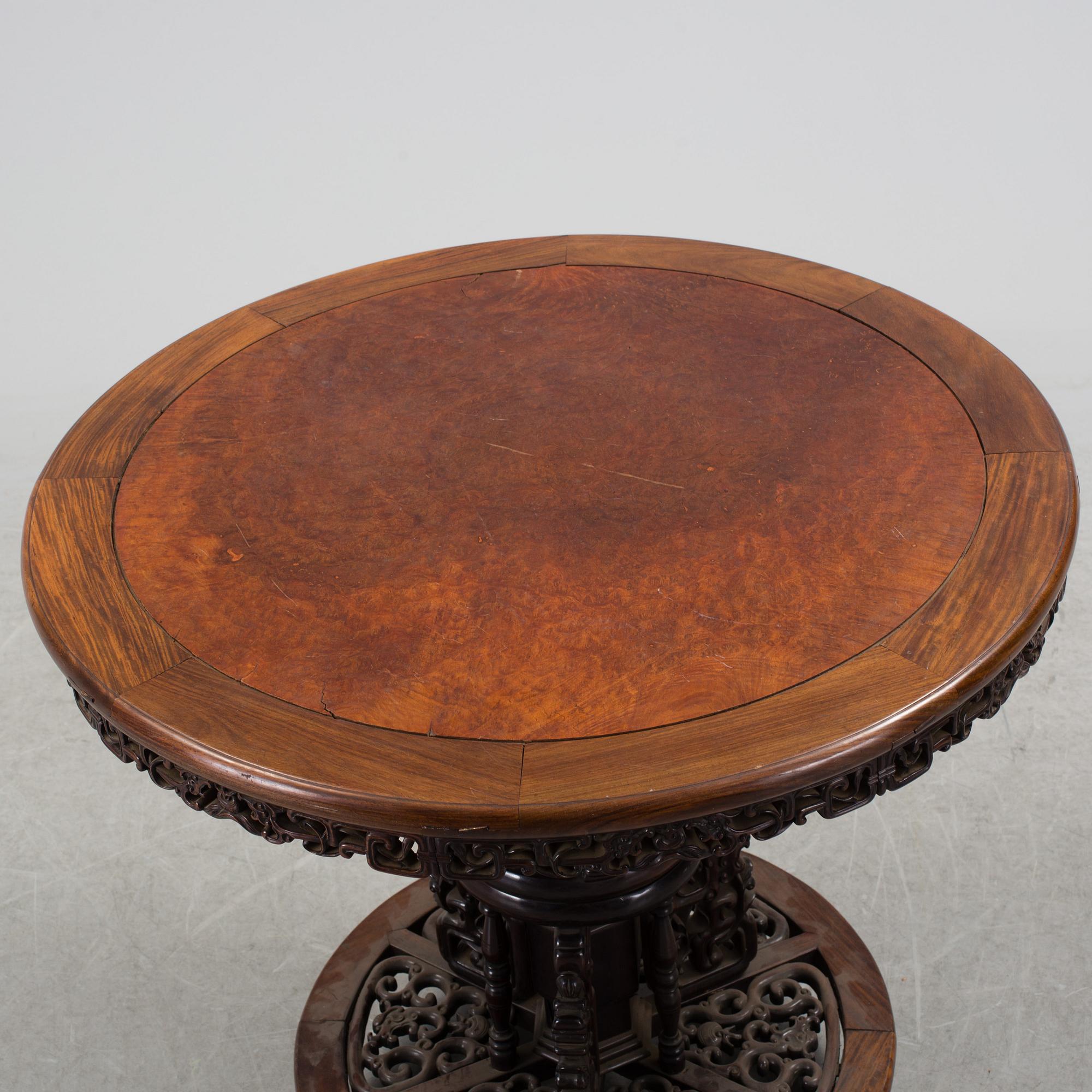 A Chinese wooden table, early 20th century.