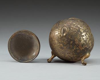 A silver gilt tripod censer, presumably Tang dynasty.