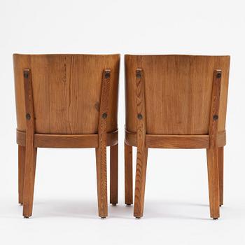 Axel Einar Hjorth, a pair of stained pine "Lovö" armchairs, Nordiska Kompaniet, Sweden, 1930s.