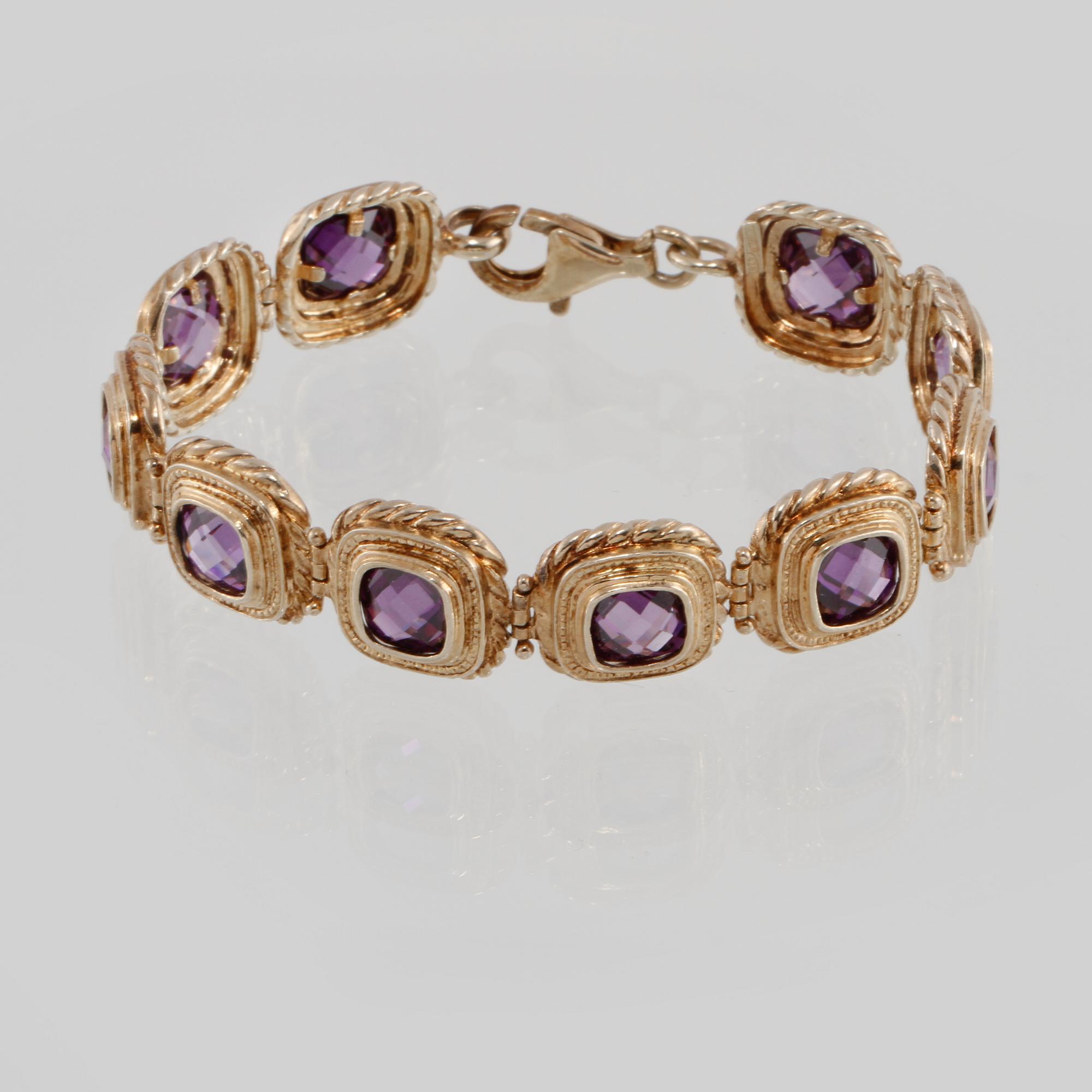 ARMBAND, förgyllt sterlingsilver med lila fasettslipade stenar. Vikt 30 gram.