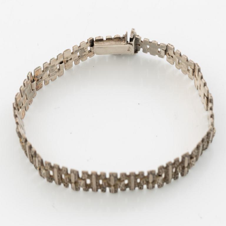 Silver bracelet.