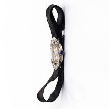 Wristwatch, 25 x 13 mm, Art Deco, rose cut diamonds, faceted sapphires, 18K white gold.