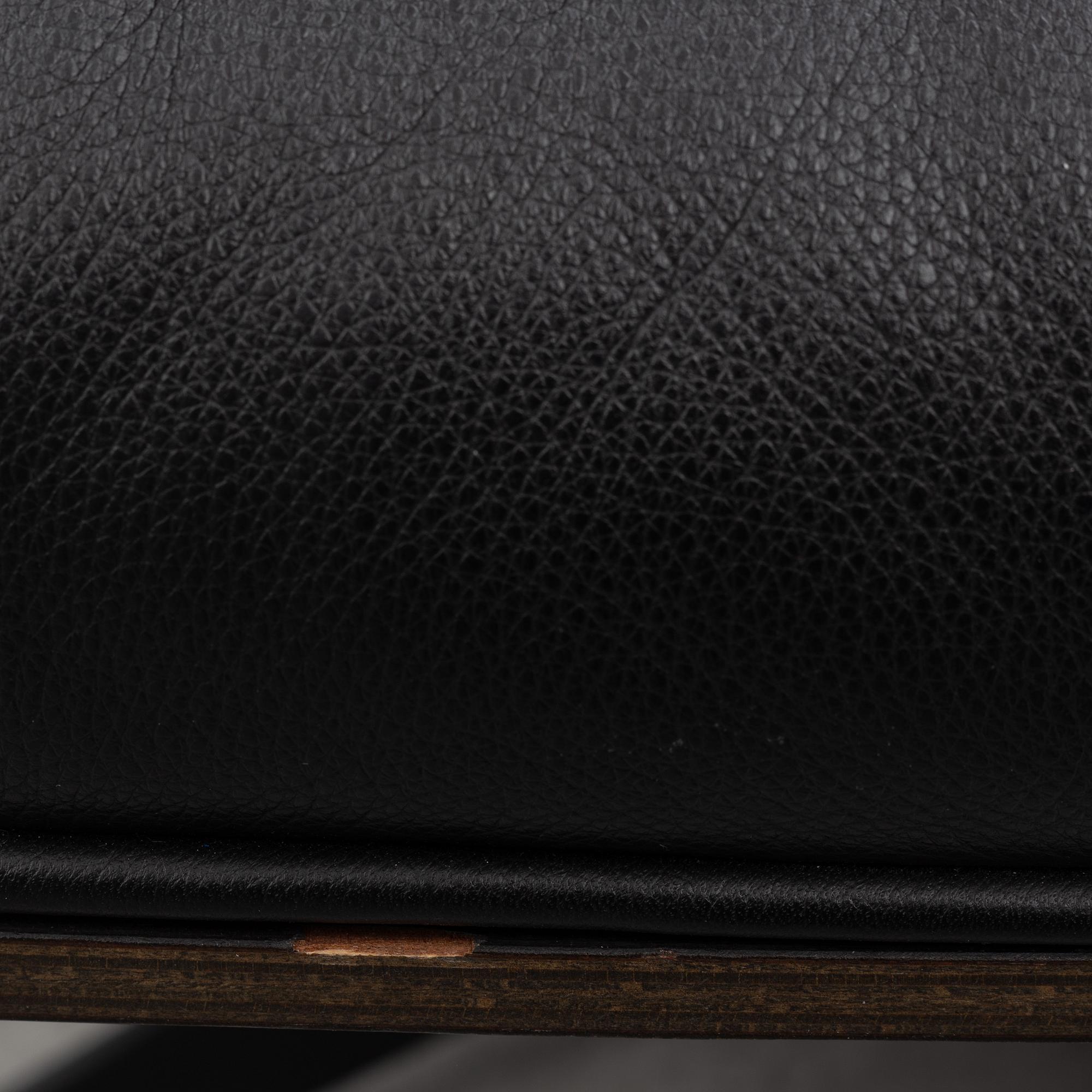 Charles & Ray Eames, an "Eames Lounge Chair" with ottoman, Vitra, 21st century.